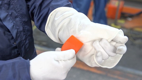 close up of white gloves